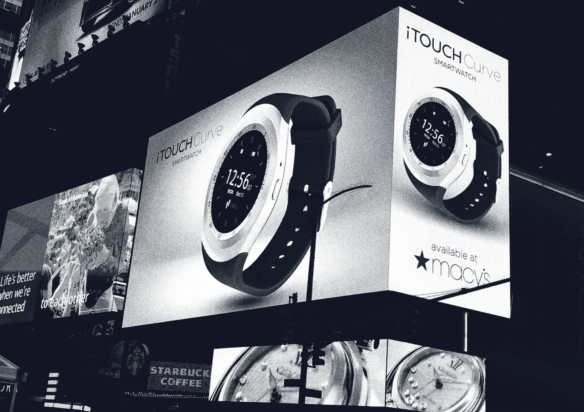 Times Square jumbo sign showing American Exchange's iTouch Curve SmartWatch.